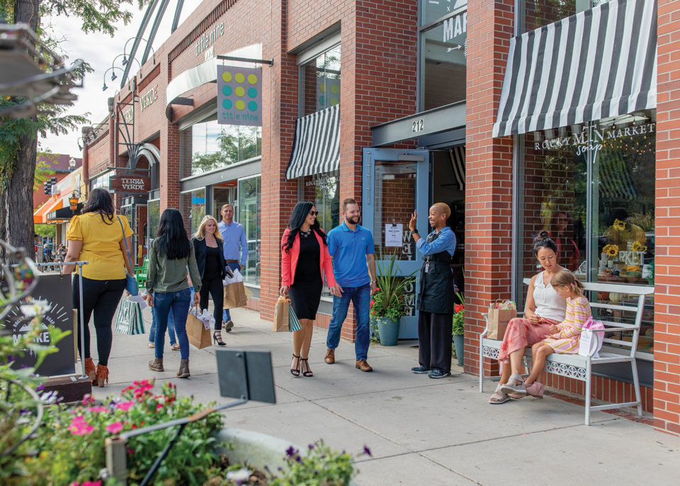 Residents of Colorado enjoy a nice day out on the streets of downtown Colorado springs.  Source is 5280 Magazine