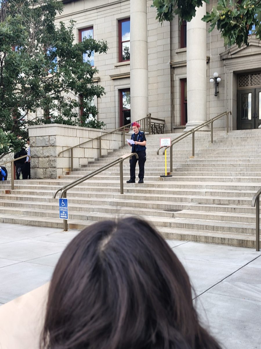 Michelangelo "Michey" Krewson giving a speech during the protest outside city hall