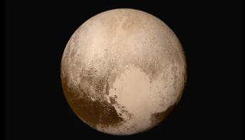 Image of the planet Pluto, showing the heart shaped crater.